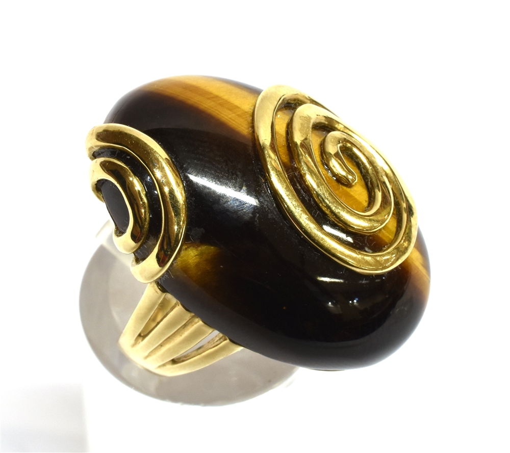 A TIGER'S EYE SET 9CT GOLD DRESS RING large oval cabochon cut tiger's eye 30mm x 20mm, 9ct gold