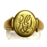 A GENTS 9CT GOLD SIGNET RING the oval head with monogrammed initials, ring size S, weighing