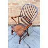 A STICKBACK WINDSOR ARMCHAIR on turned supports with H-shape stretcher base