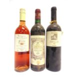 [WINE]. THREE MIXED BOTTLES comprising Chateau Cotes de Rol, Saint Emilion Grand Cru, 2000, one