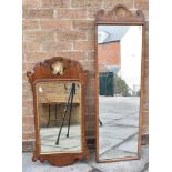 A PARCEL GILT PIER MIRROR 88cm x 47cm overall; together with another walnut wall mirror 39cm x
