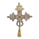 AN ETHIOPIAN BRASS PROCESSIONAL CROSS circa 1920, 49.5cm high. Provenance: Ancient World, York, with