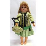 A WELSCH & CO. BISQUE SOCKET HEAD DOLL with a replacement curled long blonde wig, sleeping brown