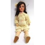 A SOCIETE FRANCAISE DE FABRICATION DE BEBES & JOUETS BISQUE SOCKET HEAD DOLL with a long dark