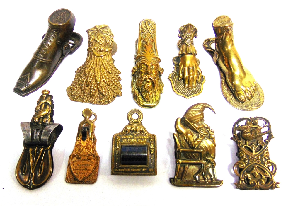 TEN BRASS LETTER CLIPS including one of Mr Punch and two by Lund, London, the largest 9.5cm high.
