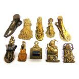 TEN BRASS LETTER CLIPS including one of Mr Punch and two by Lund, London, the largest 9.5cm high.