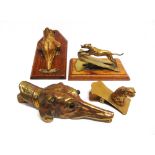 FOUR BRASS LETTER CLIPS of canine interest, the largest 15cm high.