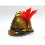 A FRENCH FIREMAN'S BRASS ADRIAN HELMET with embossed brass helmet plate 'SAPEURS POMPIERS DE