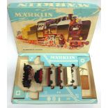 [HO GAUGE]. TWO MARKLIN TRAIN SETS comprising a No.2963, containing German Railway 0-6-0 tank