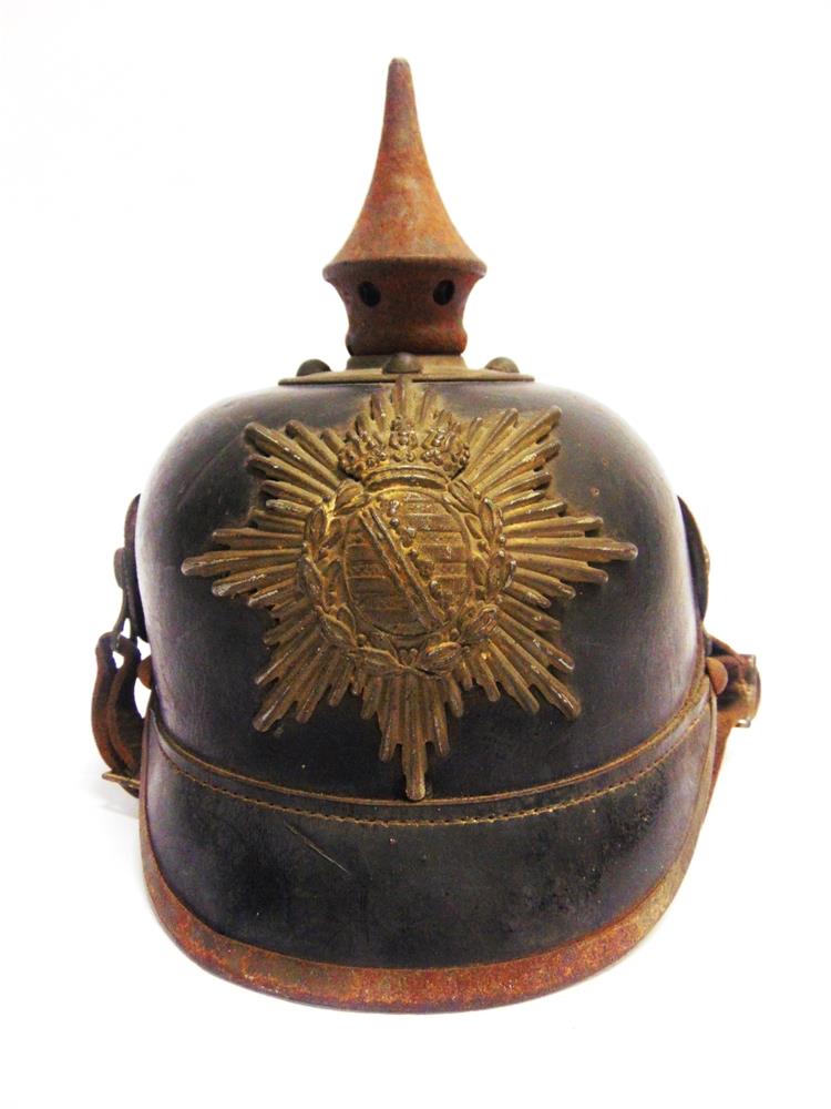 A GREAT WAR IMPERIAL GERMAN OTHER RANKS PICKELHAUBE the black leather shell with a grey metal