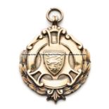 1950 Amateur Challenge Cup Final linesman's medal, silver-gilt in shield form with loop ring,