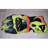 Valentino Rossi signed MotoGP memorabilia, comprising replica glove (as worn by him) and official