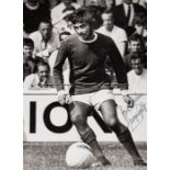 George Best signed b&w press photograph, the 12 by 9in. b&w retro image from his United playing days