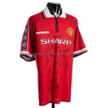 Multi-Signed Manchester United 1999 Treble Winners shirt, the 1998-99 red home retro jersey signed