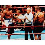 Mike Tyson v Evander Holyfield 'Bite Fight' signed photograph, photograph of the infamous fight of
