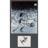 Signed George Best photographic presentation, comprising a 9 by 7in. b&w action photograph of George