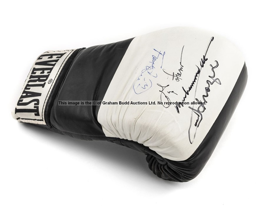 Everlast boxing glove signed by the boxing legends George Foreman, Muhammad Ali, Joe Frazier and