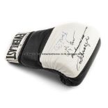 Everlast boxing glove signed by the boxing legends George Foreman, Muhammad Ali, Joe Frazier and