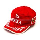 Michael Schumacher signed Dekra Cap, red cap with white embroidered DEKRA and emblem, signed in
