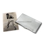 Randolph Turpin signed b&w photograph and cigarette case, photograph signed in blue ink, 5.5 by 3.