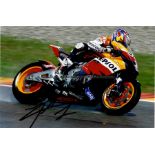 Nicky Hayden signed Honda Repsol MotoGP photograph, an 8 by 12in. shot of  the late 2006 MotoGP