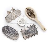 Five unusual tennis brooches and locket, a rare combined tennis and archery oval brooch; a silver