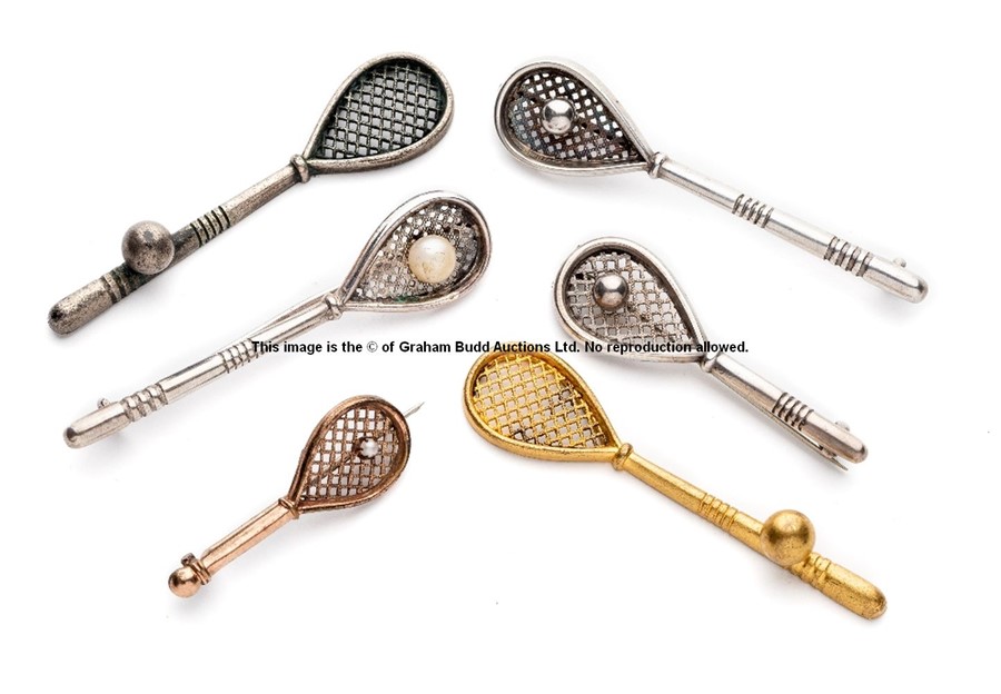 Six tennis racquet brooches, including two being J Jeffreys advertising racquets, gilt metal and