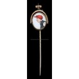 Gold & intaglio reversible stick pin of the jockey Fred Archer, the intaglio set in a stirrup design