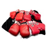 Professional boxing training equipment, four sets of red boxing gloves comprising two pairs of Cleto