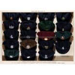 Display case containing a full set of 18 County Cricket caps and an England Test Match cap,