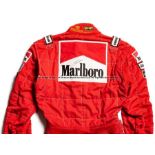 David Coulthard signed McLaren Mercedes-Benz Formula 1 racesuit, Nomex IIIA red racing suit with