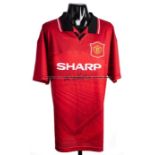 Eric Cantona signed Manchester United 1994-1996 style retro home jersey, signed to the front in