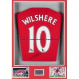 Signed football memorabilia, comprising a signed Jack Wilshere No.10 Arsenal red home jersey, signed