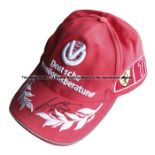 Michael Schumacher signed F1 World Champion 2000 DVAG Ferrari post-race cap,  his marker pen