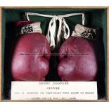 The boxing gloves worn by Henry Cooper when defending his heavyweight title against Joe Erskine, a