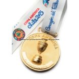Chile 2015 Copa America winner’s medal, in gilt circular form, inscribed COPA AMERICA AL CAMPEON