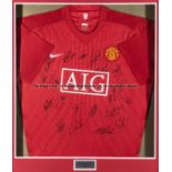 Framed Manchester United replica home jersey signed by the 2008-09 Premier League winning squad,