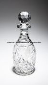 Two winning owner's prizes for races at Lingfield Park, in the form of two cut-glass decanters and