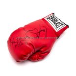Lennox Lewis and Evander Holyfield double-signed boxing glove, the red right-hand Everlast glove