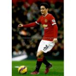 Nine signed photographs of past and present Manchester United FC players, comprising Ryan Giggs,