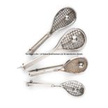 Four Victorian silver tilt head tennis racquet brooches,  each with a tennis ball on the