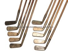 Group of ten brass head putters, makers including Spalding, Goudie & Co, SGC McCoy, Nagle & Co of