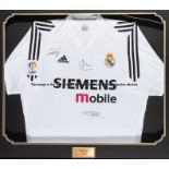 Framed Real Madrid replica home jersey signed by Ronaldo, Zidane and Figo, signed in black marker