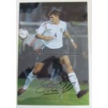 Four signed Steve Gerrard colour photographs, each signed in black marker pen, 12 x 8 in