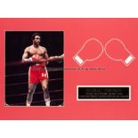 George Foreman signed photograph display, 10 by 8in. colour photo signed in black marker, mounted