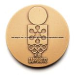 Sapporo 1972 Winter Olympic Games participation medal, bronze, designed by Shigeo Fukuda, Size 6cm.,