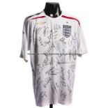 Team-signed England replica home jersey circa 2008, approx. 34 signatures in black marker