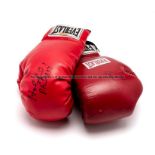 Lennox Lewis and Evander Holyfield double-signed boxing gloves, pair of red Everlast with black