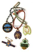 Five Cheltenham Club enamelled members’ race badges, comprising CHELTENHAM CLUB 1915 numbered 482,