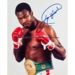 Larry Holmes World Heavyweight champion 1978-85 signed boxing photograph, original signed colour